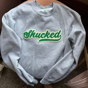 SHUCKED broadway musical crewneck